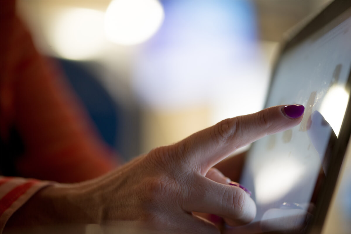 The Finger Touching The Screen